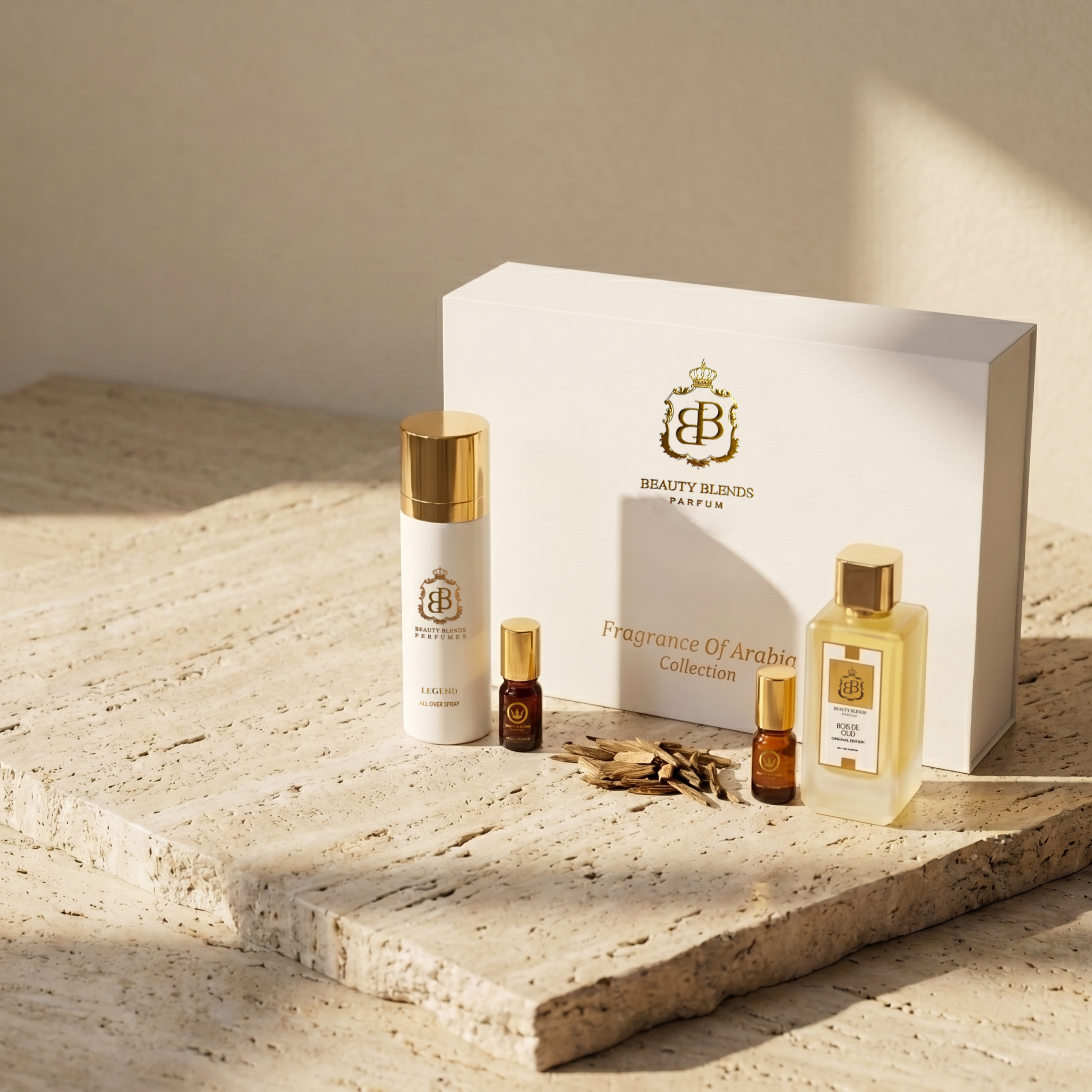 Beauty Blends perfume collection with bottles and a box on a stone surface